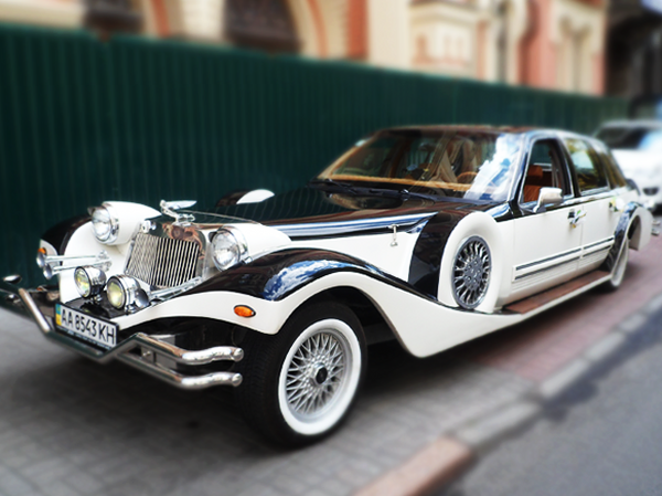 Excalibur черно-белый аренда прокат авто на свадьбу ретро